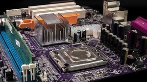 Circuit board background of PC computer motherboard. Computer circuit board close up, electronic technology background