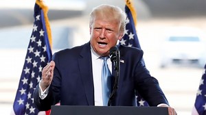 Postmaster general suspends changes to post office as Trump heads to Iowa, Arizona