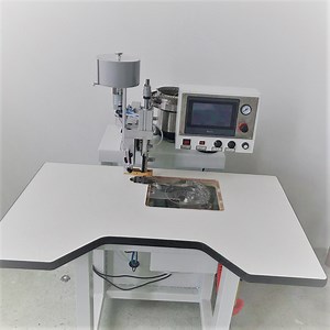 [Hot Item] New Design Beading Machine Automatic Pearl Setting Machine of Hat, Jeans, Garments, Shoes, Bags