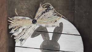 Check out this simple spring door hanger made using Dollar tree bunny garland! #decor #spring #easter #diy #dollartree #crafts #crafting #springdecor #easterdecor #Burlapkitchen | Burlap Kitchen