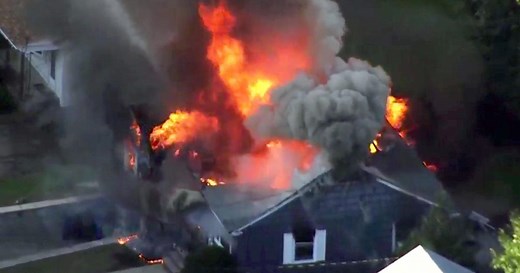 Flames from gas explosions in 3 Mass. towns