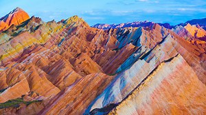 Rainbow Mountains: China's psychedelic landscape created when 2 tectonic plates collided
