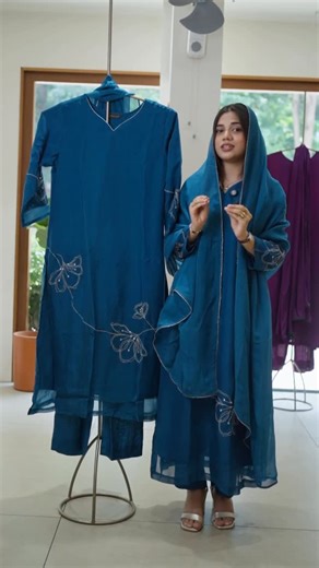 Myhof on Instagram: "MY HOF Launching Teal Blue Suit Set In Organza and The top features a V-neckline, adding a refined touch to the simple silhouette. The sleeves are full length and adorned with white floral thread embroidery, which is also beautifully placed along the lower front of the kurta in a connected vine pattern. The bottom is a straight pant in the same teal blue color Dupatta. Item Name: Organza Suit Set Size: S M L XL XXL Website code: H423 Price: Check Website Top Length 48 Sleeve