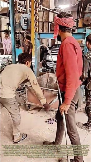 Catching Cast Tin Bars: How a Wheelbarrow Collects Molten Metal Output From a Production Line