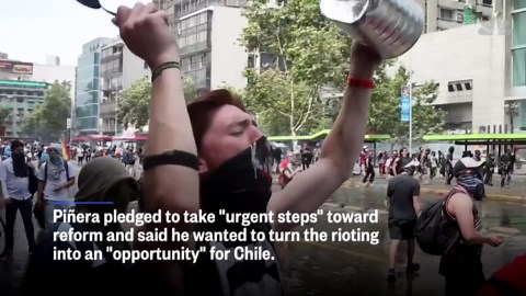 Riot police fire tear gas to disperse protests in Santiago, Chile