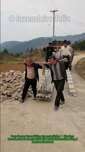Four-Person Team Lifting Concrete Slabs #ManualHandling #ConstructionWork