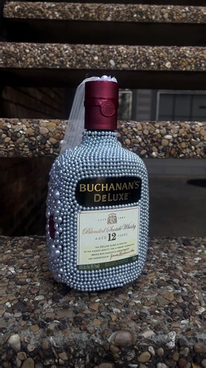 Decorated bottles for a wedding 💒 🤍🫧 #decoratedbottle #pearls #fyp #wedding #bottle