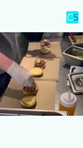 Building Pork Sandwiches at Moe's Original BBQ