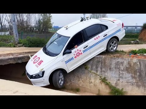 A Car Collided And Fell Off A Road Embankment; The Driver Managed To Save Himself.