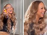 Mariah Carey shares a funny and playful moment behind the scenes during shoot
