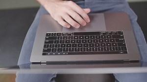 A person typing on a laptop, top view - Free Stock Video
