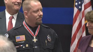 Avon officer who shot mall attacker receives bravery award