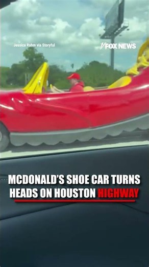 A bizarre McDonald’s-inspired car was spotted cruising through Houston traffic...