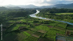 Philippines nature countryside, scenic river valley and mountains, sunset aerial