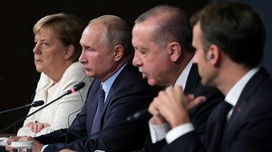 Merkel, Macron seek Syria talks with Putin and Erdogan