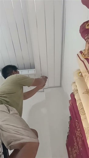 The process of installing a ceiling lamp.
