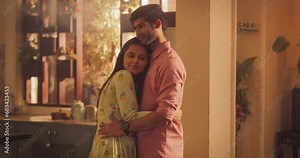 Young Couple Slow Dancing in the Kitchen with Romantic Passion and Tenderness. Sharing a Moment of Love and Affection with Each Other. Slow Motion Medium Shot