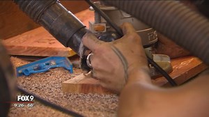 Jeff Passolt surprises Kelcey Carlson with a gift for her new cabin