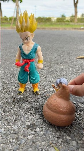 Gohan drops a poop toy into the bathtub