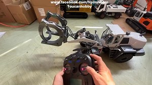 120K views · 1.7K reactions | Test before shipment, the hydraulic XDRC 580 loader in 1/14 scale with log grapple attachment 朗朗 powerful  #hydraulicrc #construction #hydraulic #loader #xdrc | Toucanhobby RC Model | Facebook