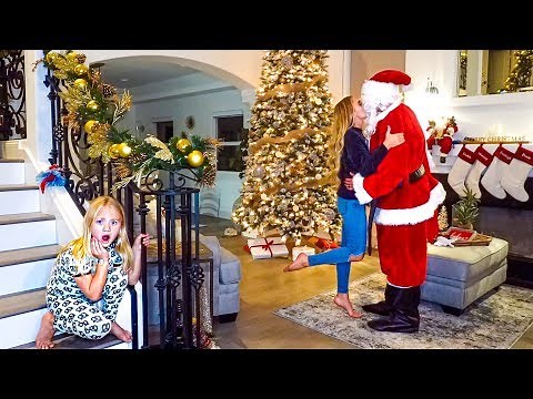 Everleigh Catches Her Mommy Kissing Santa Claus...