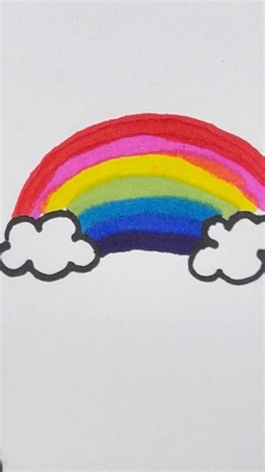 A rainbow is a colorful arc in the sky after rain 🌈
