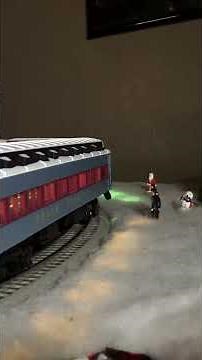 Lionel's GG1 Polar Express stops to pick up passengers!