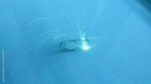 Metal 3D printer. Work 3d printer for metal close-up. 3D printer printing object from metal powder by laser sintering. New modern technologies of printing 3D printer.Selective laser melting technology