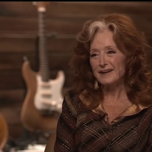 25K views · 2.5K reactions | In case you missed it, over the weekend PBS NewsHour ran a terrific interview segment featuring a conversation with Bonnie and chief Washington correspondent, Geoff Bennett. If you're curious about the origin of the song "Down The Hall," from Just Like That..., this piece dives in to how Bonnie came to write it. -- BRHQ https://youtu.be/otjMmUKOrg8 | Bonnie Raitt | Facebook