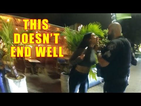 Belligerent Drunk Woman Instantly Regrets Slapping Cop's Hand