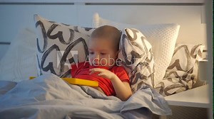 child learning alphabet on smarty alphabet tablet to learn letters, ABC, numbers, shapes, colors, music and words. Interactive toddler learning and education toys for kids boys and girls