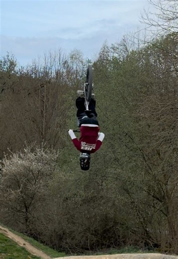 First Mountain Bike Backflip with Jib Clothing