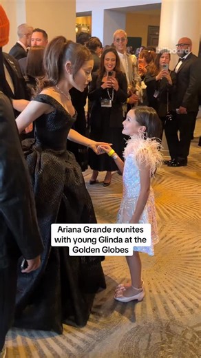 Ariana Grande reunites with little Glinda (Scarlett Spears) from at the #GoldenGlobes | Billboard