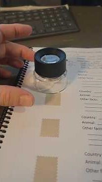 How to use a magnifying glass to see the tiny words on stamps #magnifiers