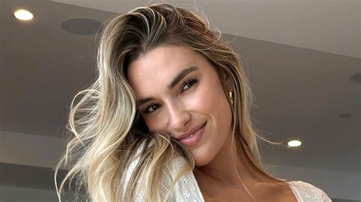 Kayla Simmons nearly bursts out of top as fans say 'you're so hot it annoys me'