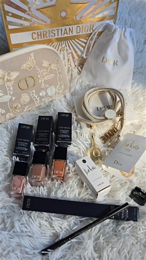 J'adore | Dior Promo Codes • Sephora Promo Codes • GWP on Instagram: "@diorbeauty unboxing ✨️🤍✨️ Items I purchased in this order: • Dior Vernis nail polish in 449 Dansante • Dior Vernis nail polish in 323 Dune • Dior Vernis nail polish in 100 Nude Look • Diorshow On Stage Crayon Waterproof Kohl Eyeliner Pencil in 099 Black Gifts: • Dior J'adore phone strap (automatic freebie added to cart with second purchase) • Dior floral pouch using promo code MYCART with $130 purchase #diorbeauty #diorbeaut