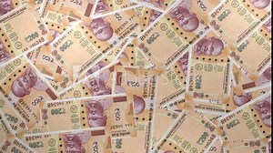 200 Indian Rupee bills background. Many banknotes. Finance. Business concept. Lottery, jackpot.