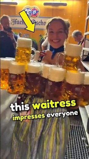 This waitress impresses everyone at Oktoberfest with her incredible strength!