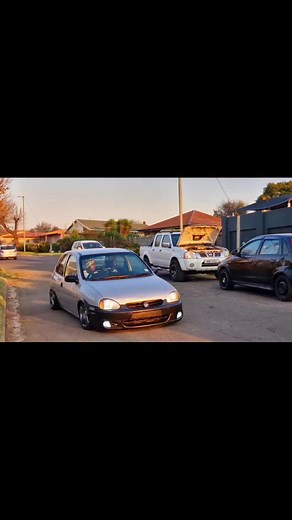 Custom Silver Car Showcasing Turbocharged Engine Modifications