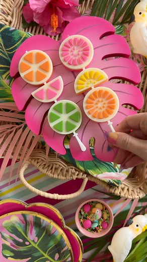 Cabana Cake Pops 🌺🍋‍🟩These tropical cake pops are a fun summer treat inspired by the Cabana Summer collection at @michaelsstores! Directions: To create cake pop dough - bake desired cake mix and while the cake is cooling add to a stand mixer using the paddle attachment. Blend into a breadcrumb consistency and add 2 tbsp of desired icing. Let dough chill in the refrigerator for a couple hours and then add in your desired sprinkles. Melt desired candy melts in microwave in 30 second intervals a