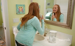 Water Flossing is so easy, just one of the many reasons it is one of the best devices to add to your oral care routine! Visit http://bit.ly/1UwaSi4 to learn more about why the Waterpik Water Flosser is the easier and more effective way to floss. | Waterpik Oral Health