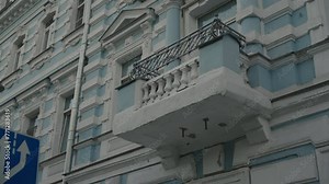 Moscow architecture with a balcony in a historical landscape. Beautiful balcony on a historic residential building