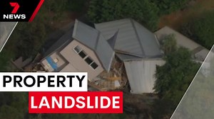 House falls down cliff in landslide