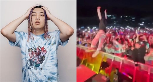 Rapper Uneducated Kid takes a tumble after a failed attempt at crowd surfing during a university festival