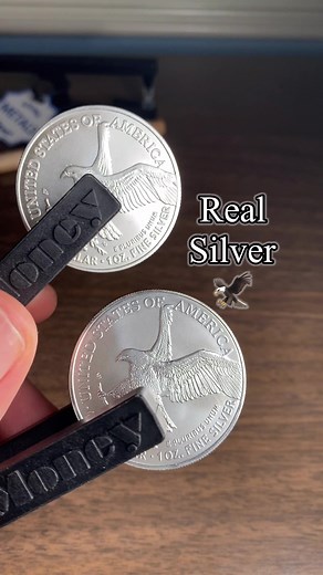 Fake Silver Eagle 🦅 vs Real Silver Eagle - ping test Silver Eagles have two known distinct pings. One smooth and resonant, the other with a tight vibration. Always check weight and dimensions. *** If you or someone you know would like to test metals with a Pocket Pinger, they’re available on the link in the profile. Disclaimer: All the risks associated with pinching a coin in between your fingers and then tapping it with plastic and/or wood are present when using the device. The ping test is us