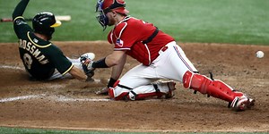 Huff a busy backstop in big league debut