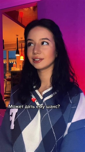 Cozy Indoor Setting with Dark Sweater Aesthetic