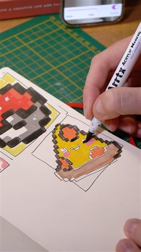 Drawing pixel pizza with acrylic markers