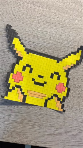 Dhanvi jain on Instagram: "If this Pikachu made you smile, my mission is complete 💛⚡ pixel art, pikachu art, pokemon drawing, cute pixel design, aesthetic pixel art, handmade artwork, grid art, creative reels, fanart aesthetic, satisfying drawing reel, aesthetic art inspo, art reel ideas, viral art content, drawing inspiration, cute character art"