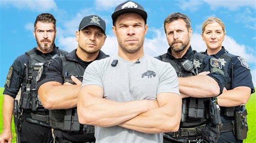 Police officers compete for $500 bench press prize